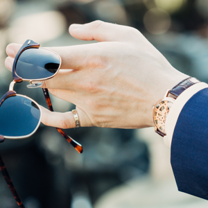 Sunglasses in hand